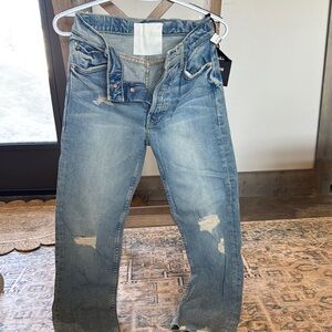 Distressed Blue Jeans